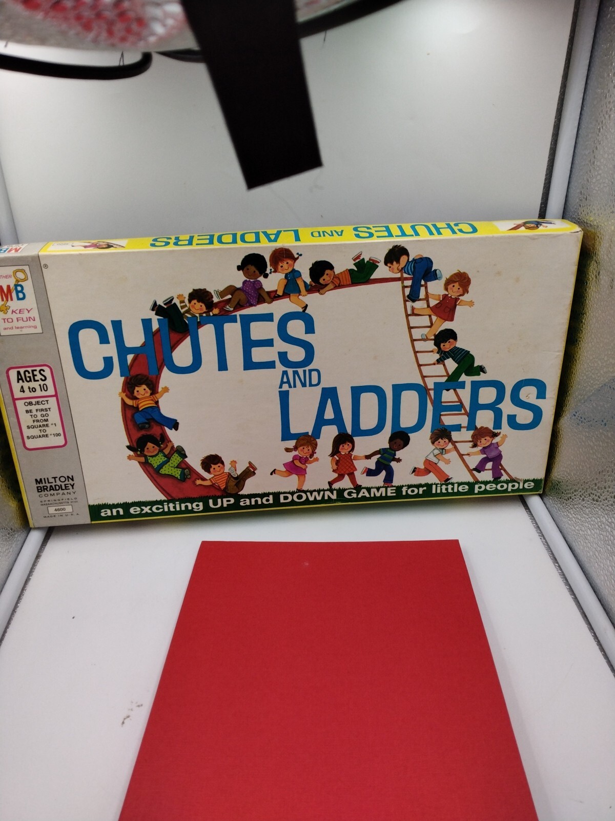 box with red packaging toward it
